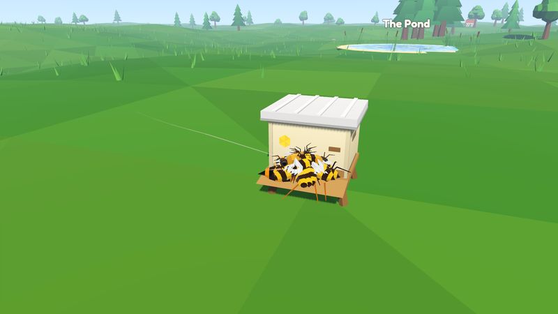 A hornet on the landing board buried under a ball of bees